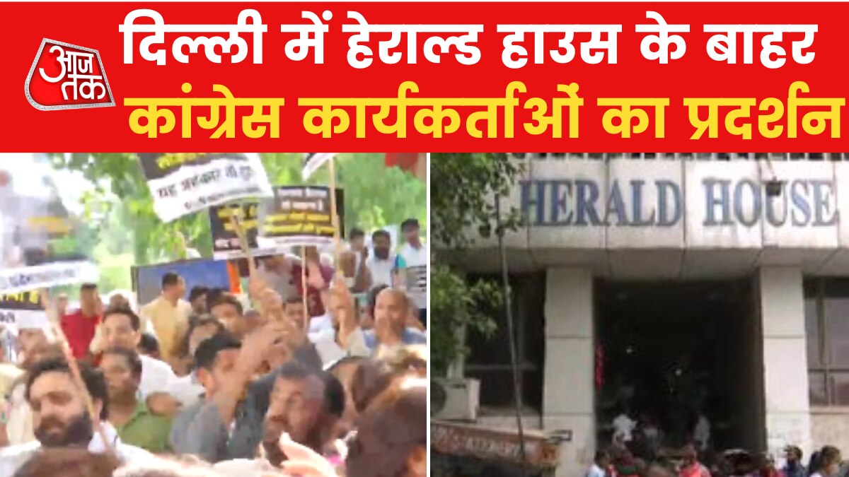 Congress workers protest outside Herald House in Delhi