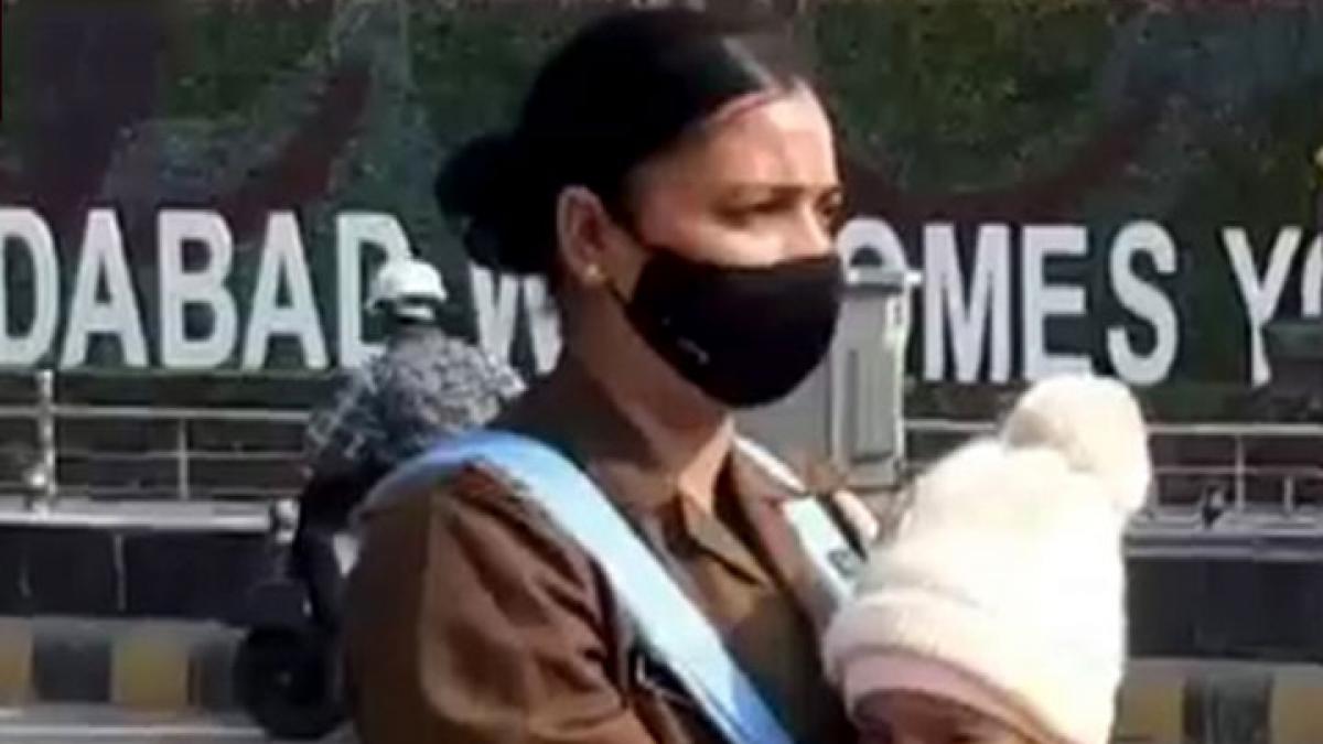 constable carrying child