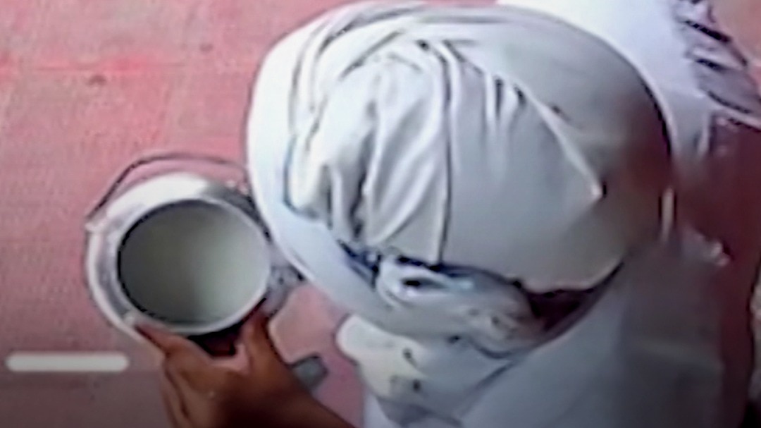 A man used to distribute milk to people after spitting in Lucknow
