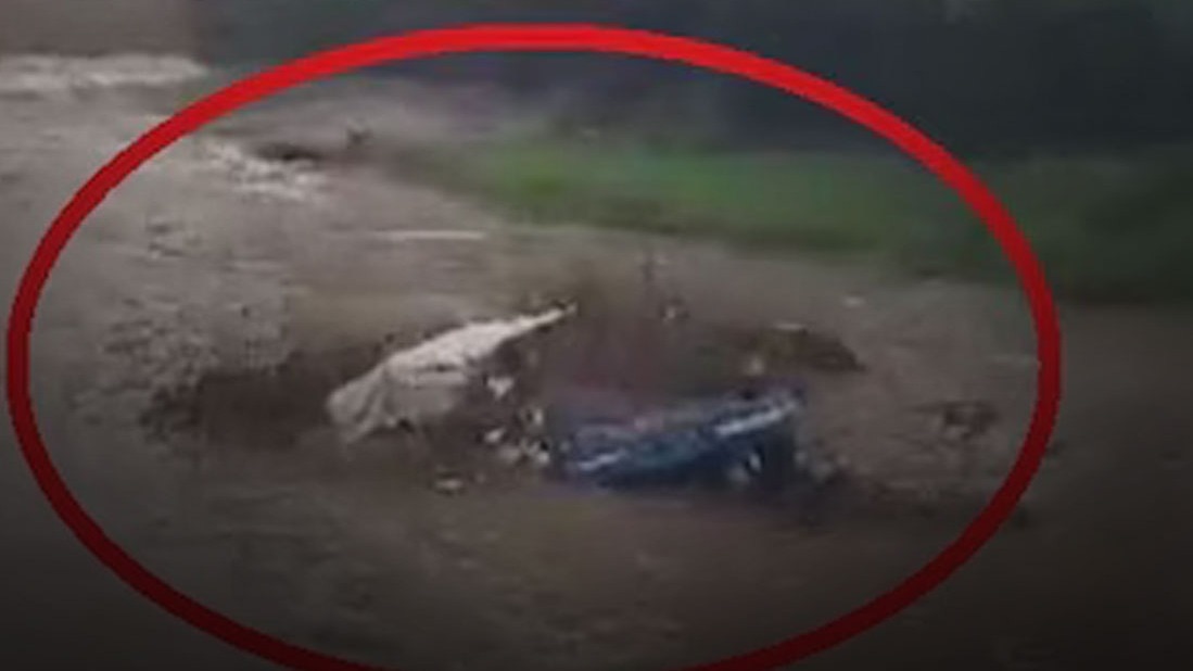 Tractor Swept Away