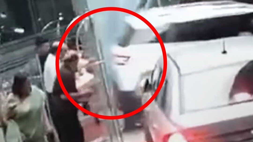 woman driver drove her car inside a hotel