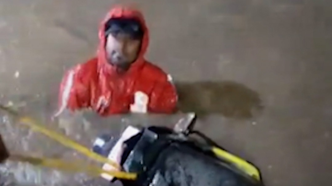 hyderabad rain and delivery boy fell in drain