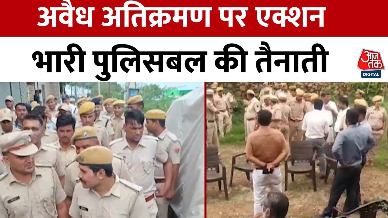 Bulldozer action against illegal constructions in Ajmer, with a heavy police presence.