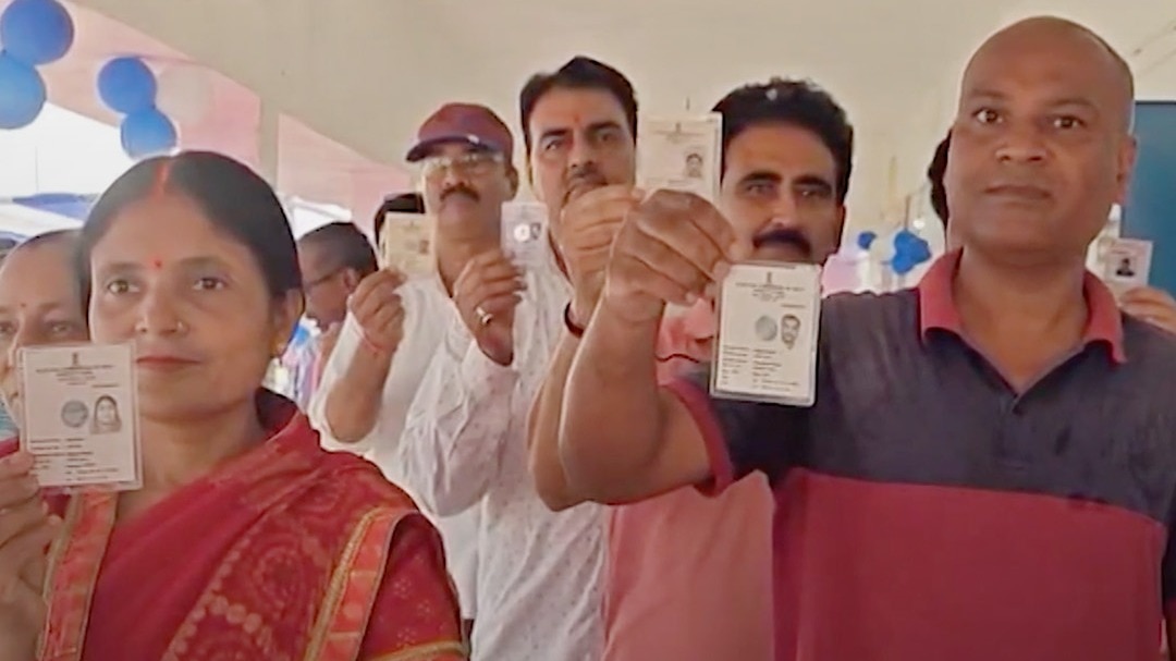 postal ballot to evm