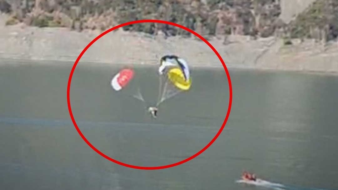 Paraglider falls into lake SDRF team reaches by high speed boat to rescue in tihri