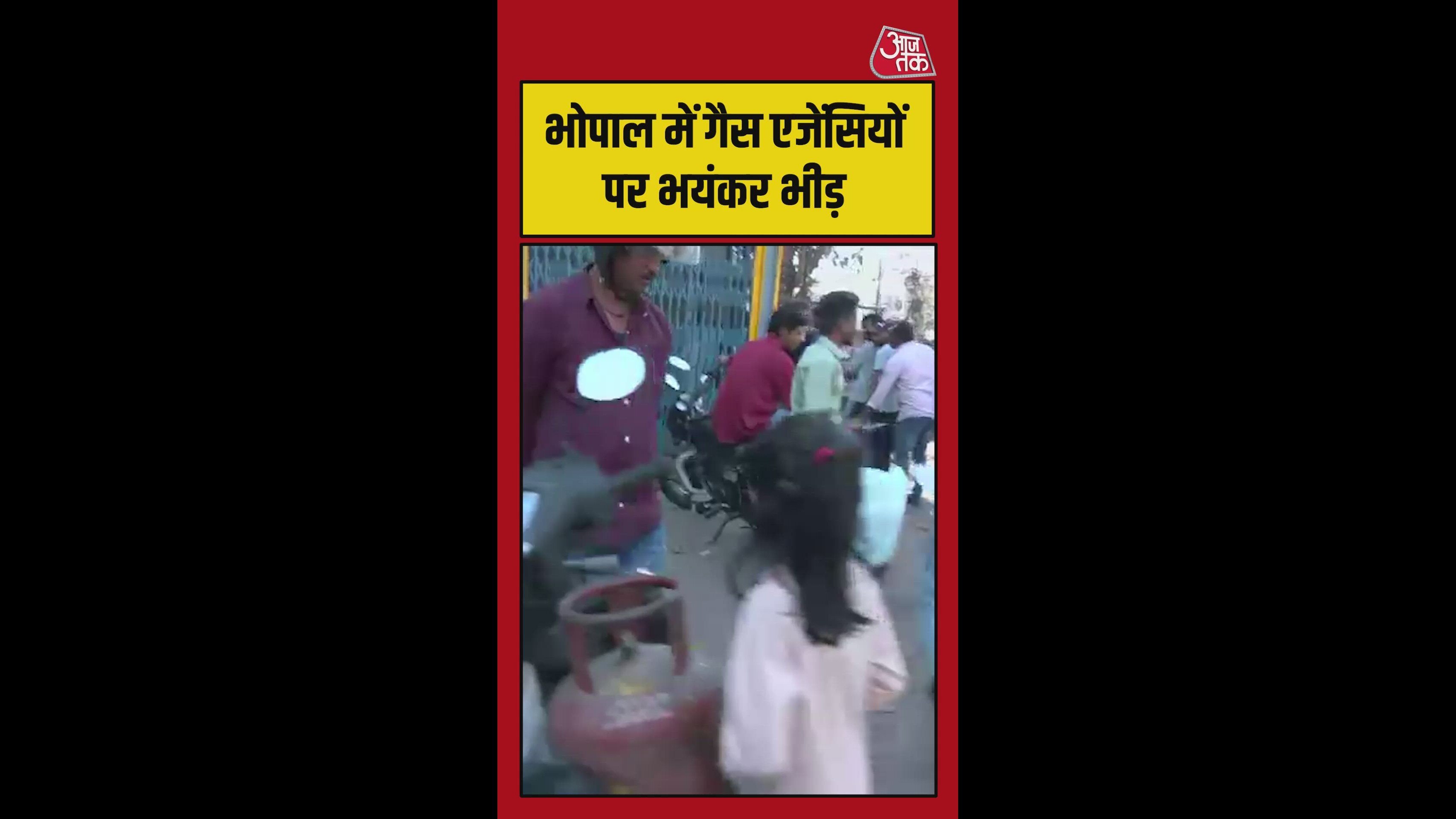 people waiting with cylinders showing ground realities of government work