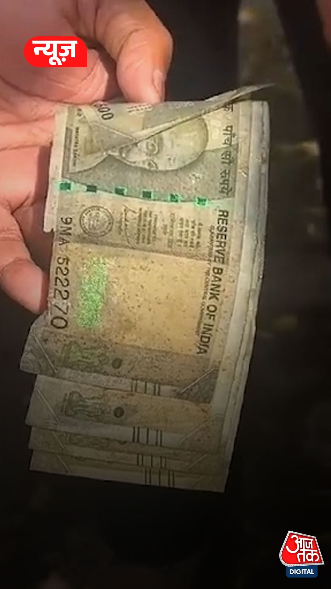 five hundred notes flowing in sewerage in bikaner