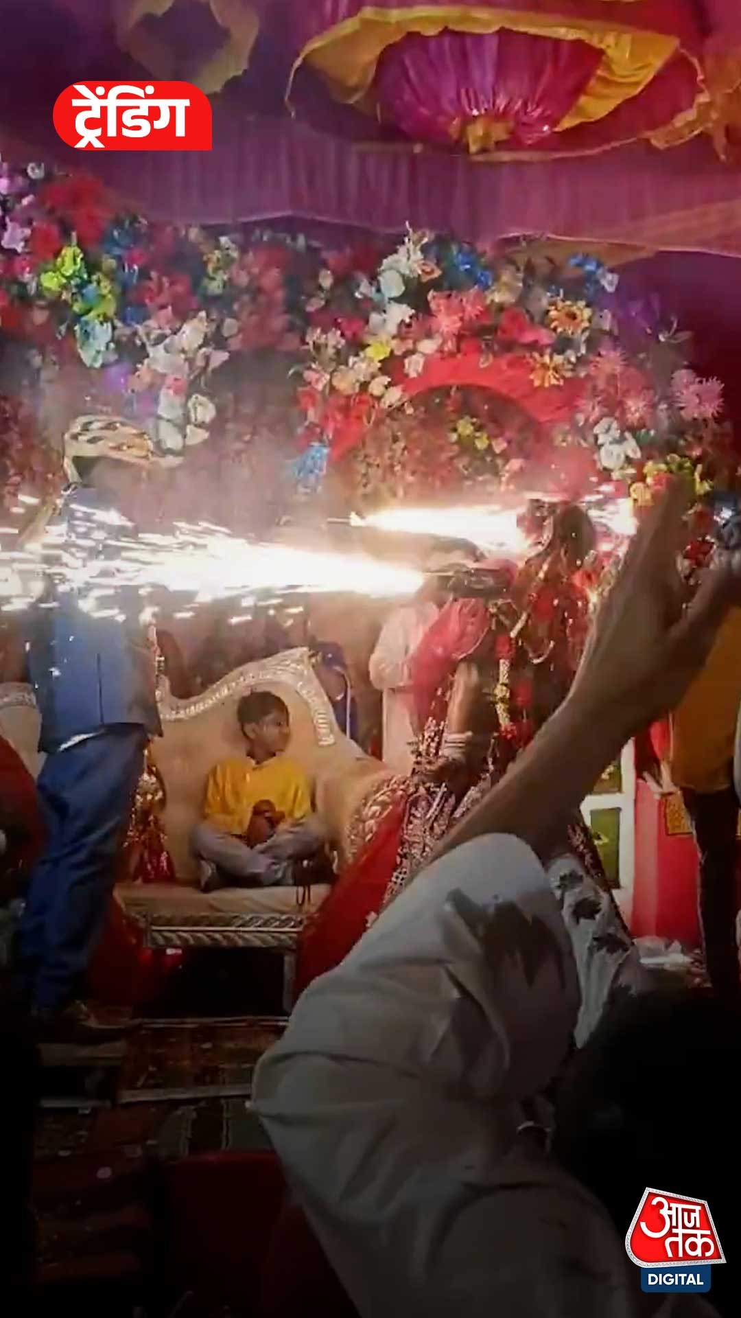 Bride and groom point spark guns at each other on stage, Viral Video