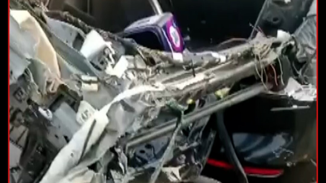 mercedes crashes into stopped container