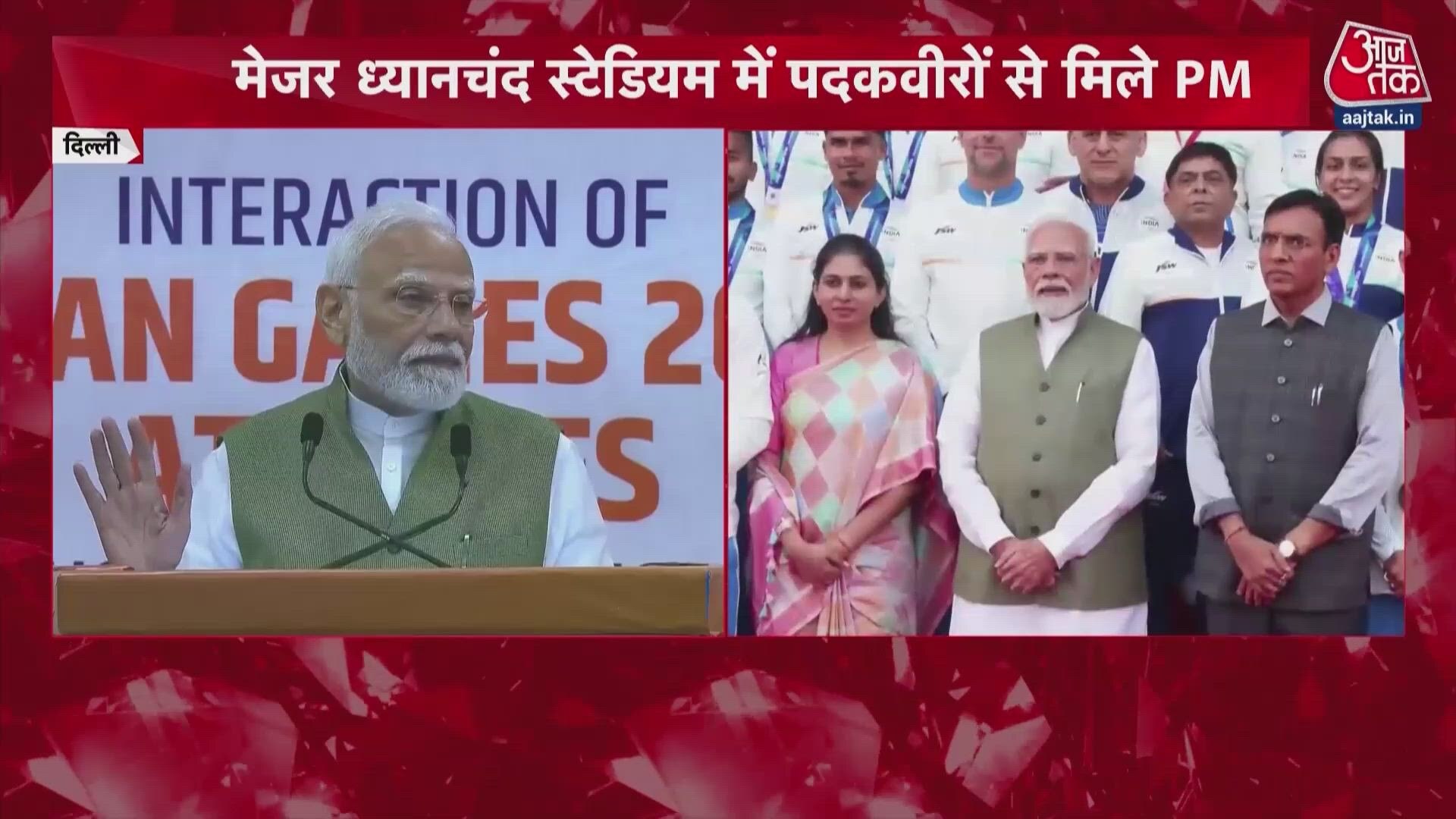 PM Narendra Modi meets and addresses Asian Games medalists.