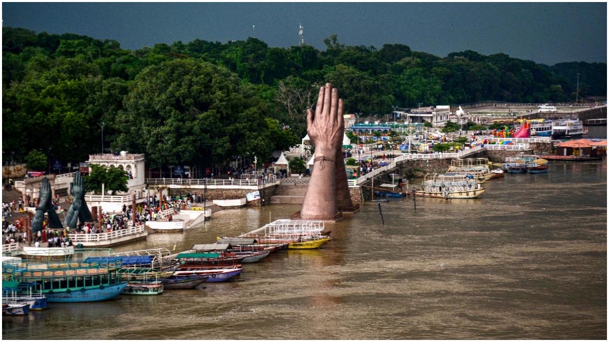 A swollen Ganga river at Namo Ghat as the water level rises following heavy rainfall, in Varanasi, A swollen Ganga river at Namo Ghat as the water level rises following heavy rainfall, in Varanasi,