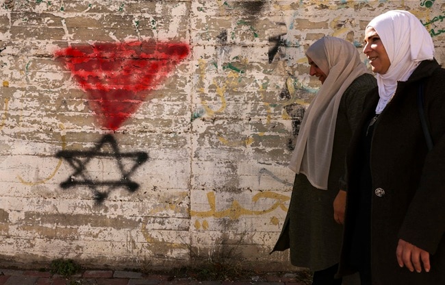 inverted red triangle jewish vs hamas (Photo- AFP) inverted red triangle jewish vs hamas (Photo- AFP)