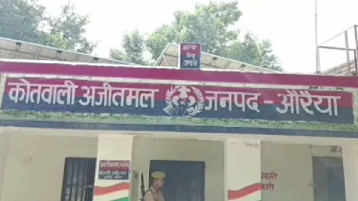 Auraiya Liquor Shop Theft Youth Steals Cash With Liquor Bottle In Mouth CCTV