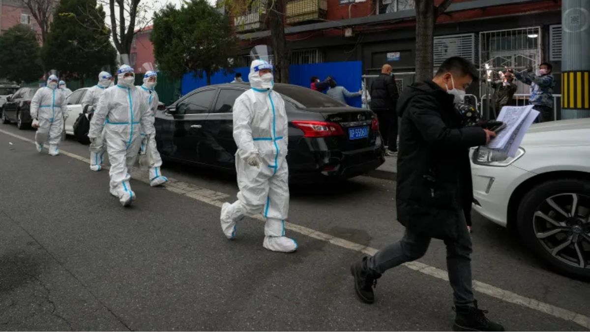 चीन में बढ़ाई गई कोरोना की मास टेस्टिंग (फोटो: AP) चीन में बढ़ाई गई कोरोना की मास टेस्टिंग (फोटो: AP)