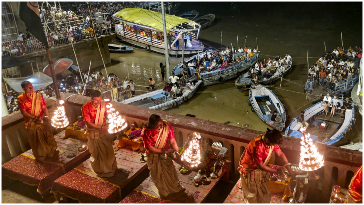 Due to the rising water level of the Ganges in Varanasi, the Ganga Aarti is being performed on the roof of Sheetala Ghat