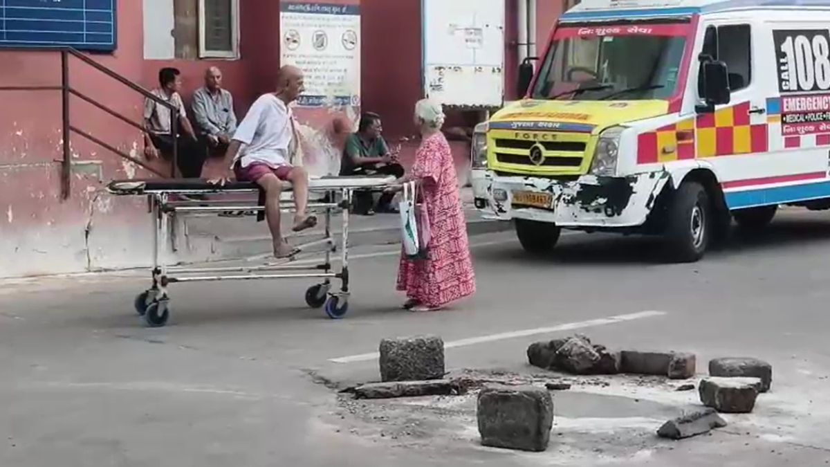 Elderly Woman Forced to Pull Stretcher Herself Rajkot Hospital Video Viral Elderly Woman Forced to Pull Stretcher Herself Rajkot Hospital Video Viral