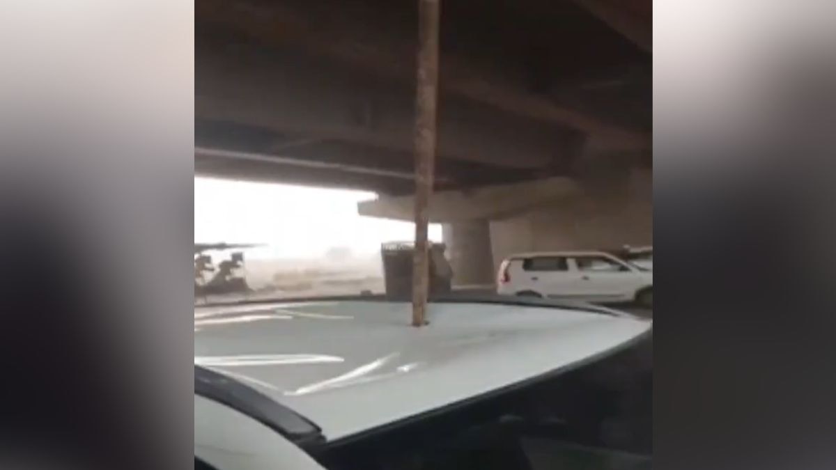 gurugram flyover steel rod falls on car during storm gurugram flyover steel rod falls on car during storm