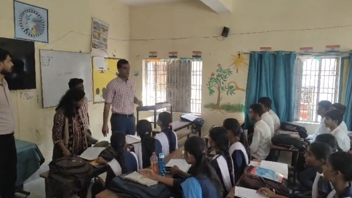 Katihar DM Sits With Students Teaches Promotes Self Reliance Midday meal Washing Own Plate