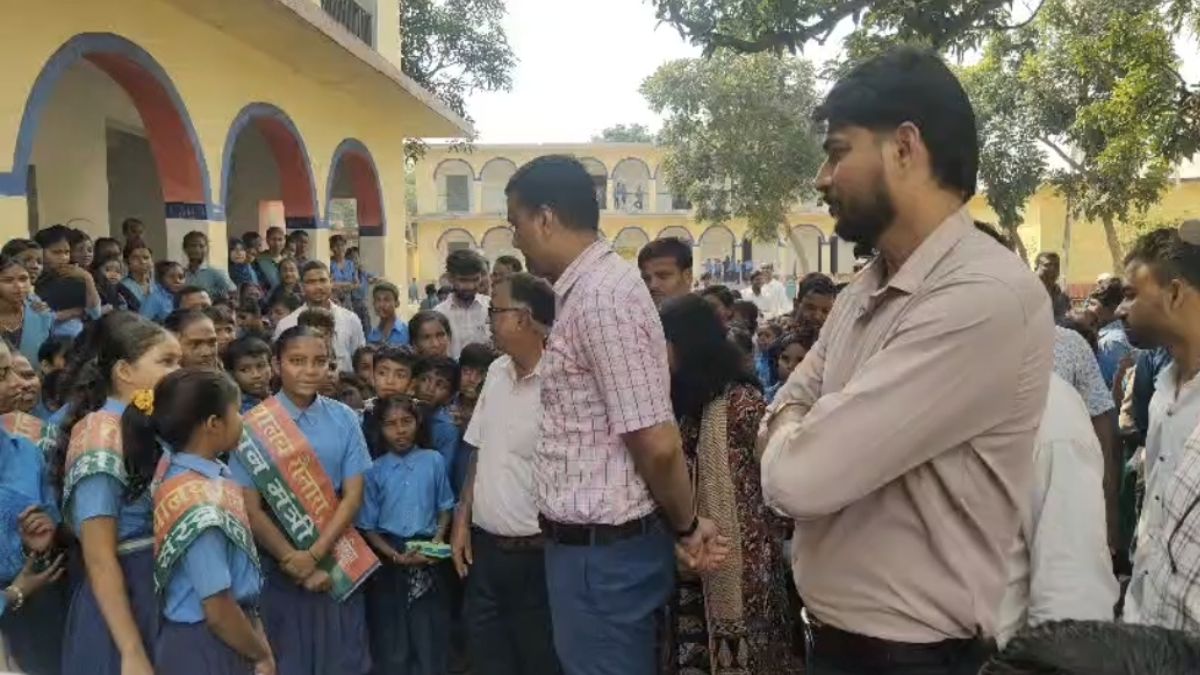 Katihar DM Sits With Students Teaches Promotes Self Reliance Midday meal Washing Own Plate