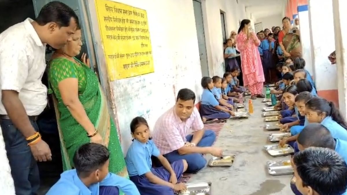 Katihar DM Sits With Students Teaches Promotes Self Reliance Midday meal Washing Own Plate