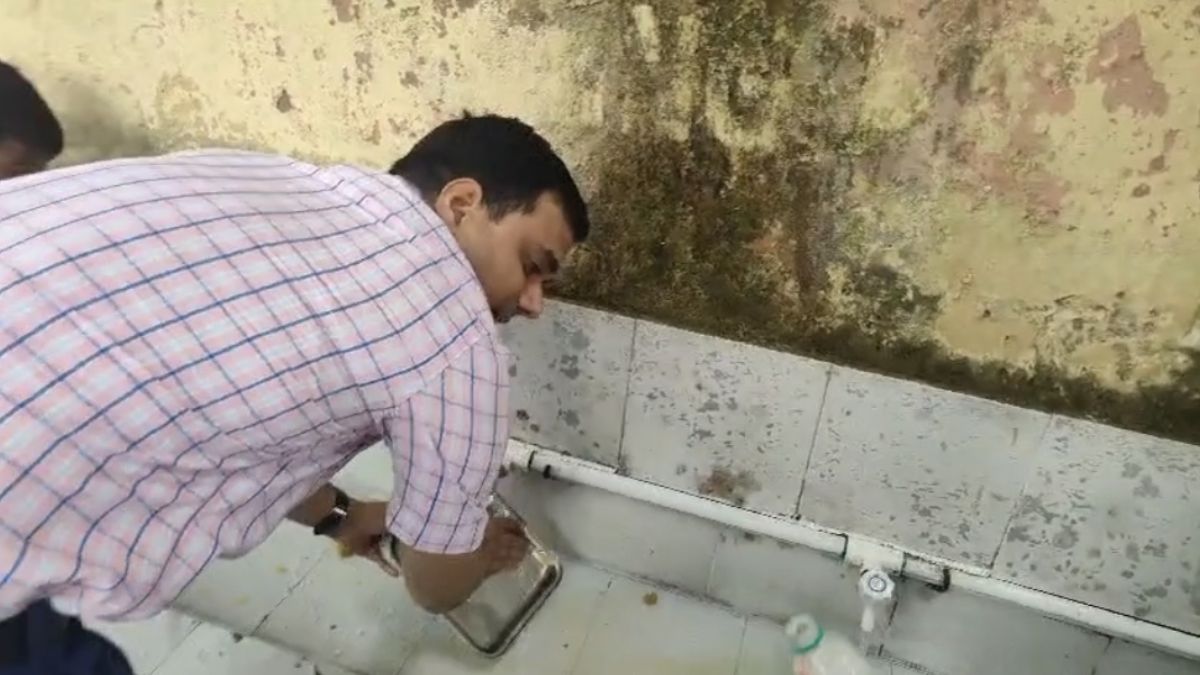 Katihar DM Sits With Students Teaches Promotes Self Reliance Midday meal Washing Own Plate