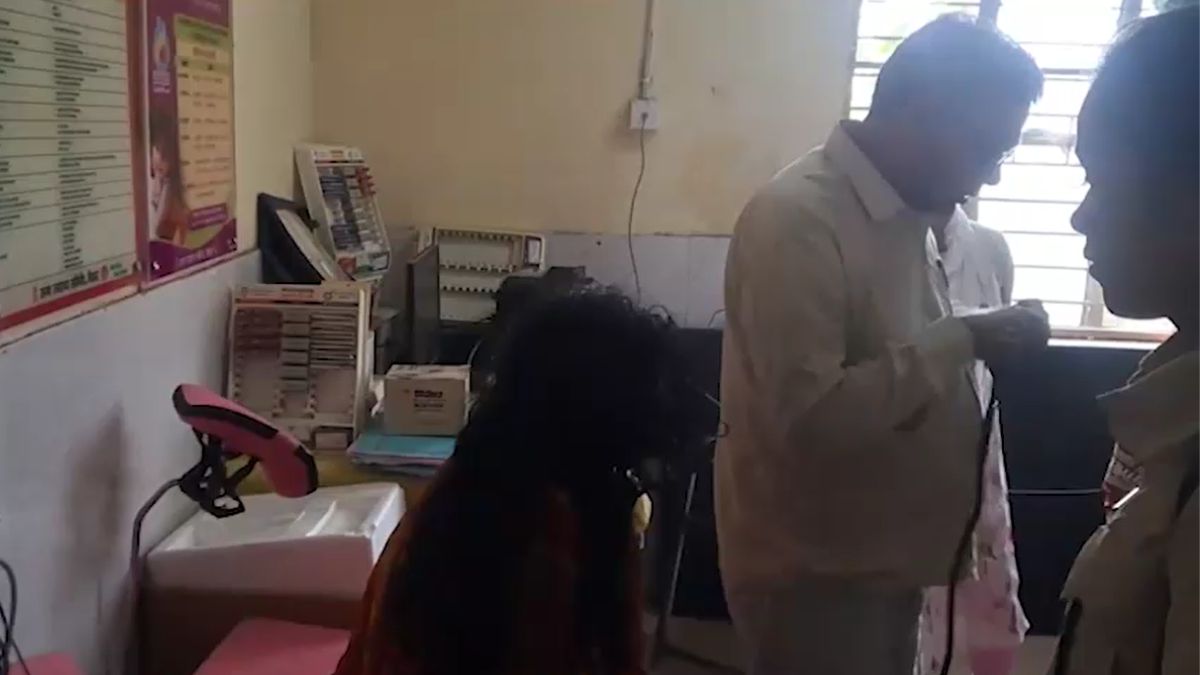 madhubani woman beaten tied to electric pole video loan dispute