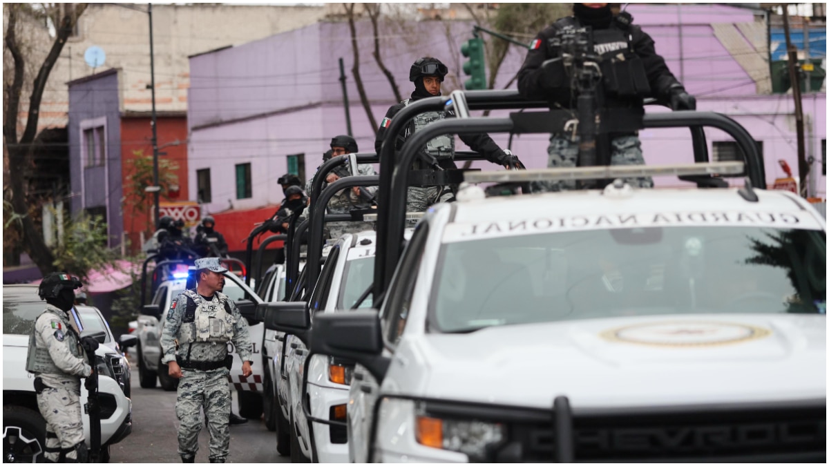 National Guards patrol the area outside of the General Prosecutor's headquarters in Mexico City, Sunday