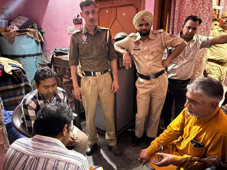 Officials from Punjab Police during the raid. Officials from Punjab Police during the raid.