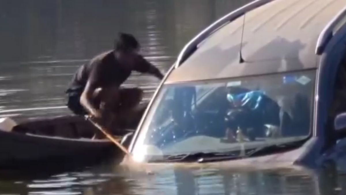 pilibhit car sinks pond two heroes rescue driver viral video