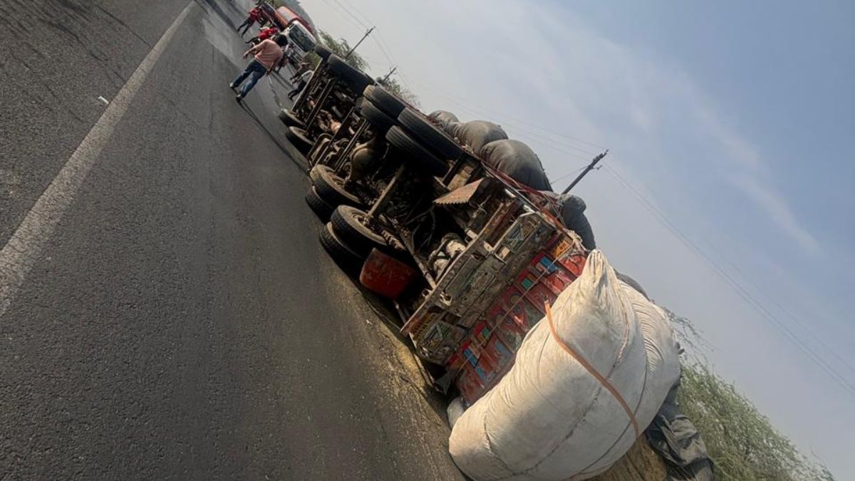 Rajgarh truck loaded with fodder rolling then overturned highway