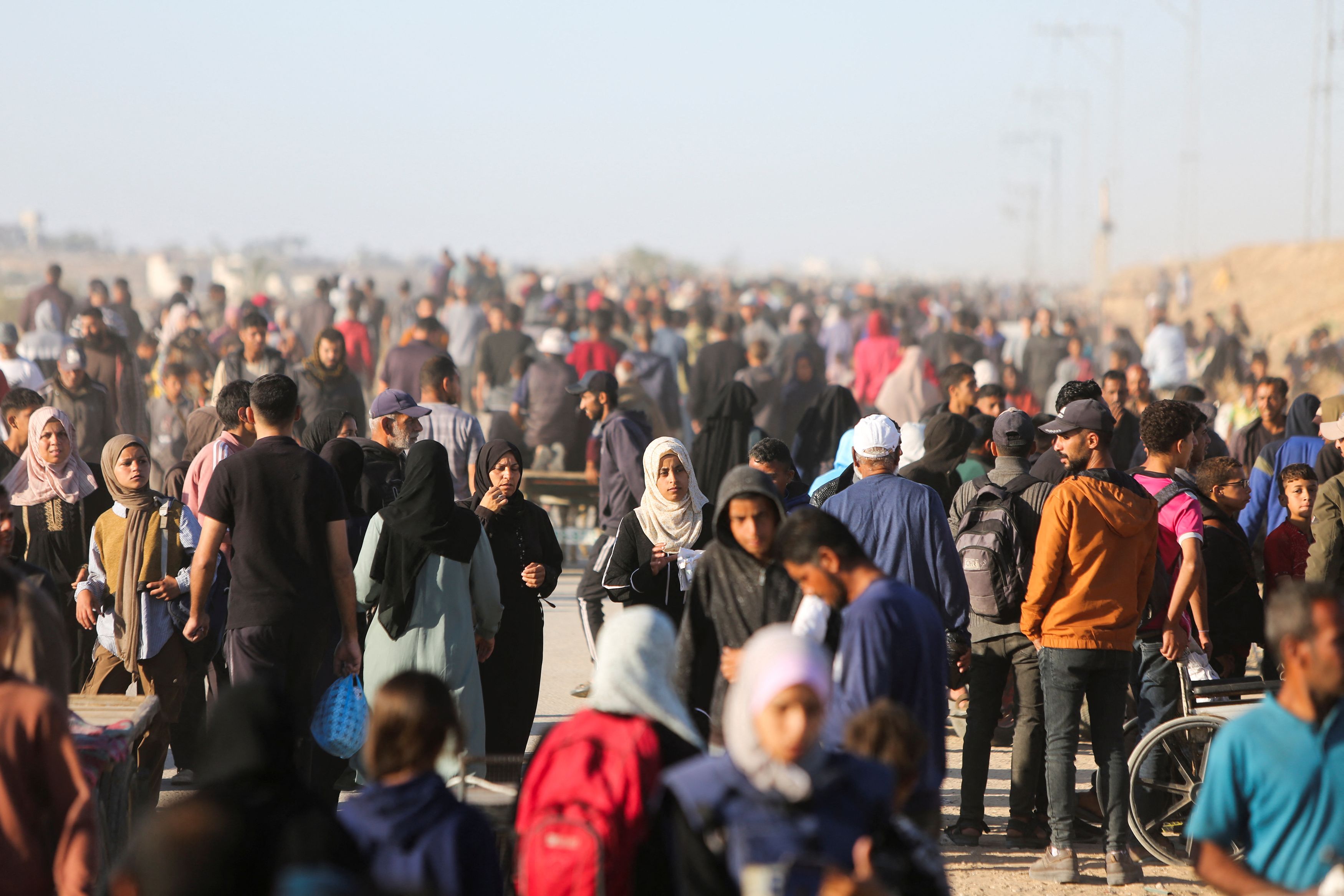 Palestinians gather to collect aid supplies 