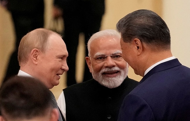 PM Naredra Modi with Xi Jinping and Valdimir Putin (Photo- Reuters) PM Naredra Modi with Xi Jinping and Valdimir Putin (Photo- Reuters)