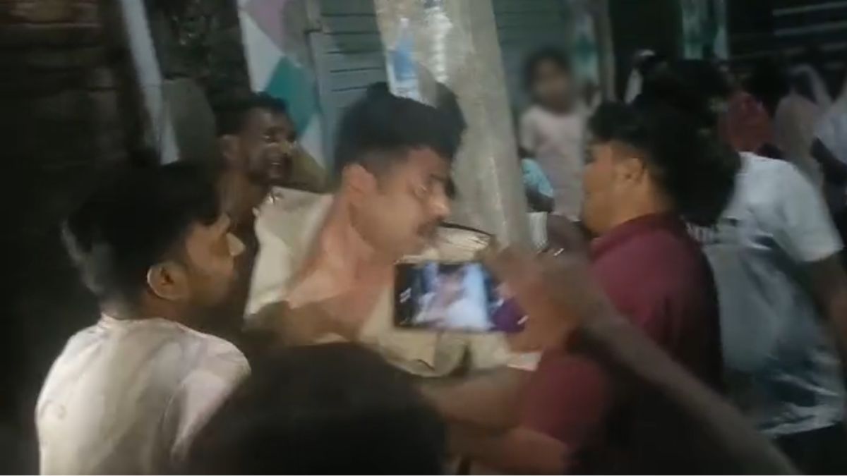 Sahibganj ASI suspended alleged drunken ruckus villagers tie him pole thrash him Sahibganj ASI suspended alleged drunken ruckus villagers tie him pole thrash him