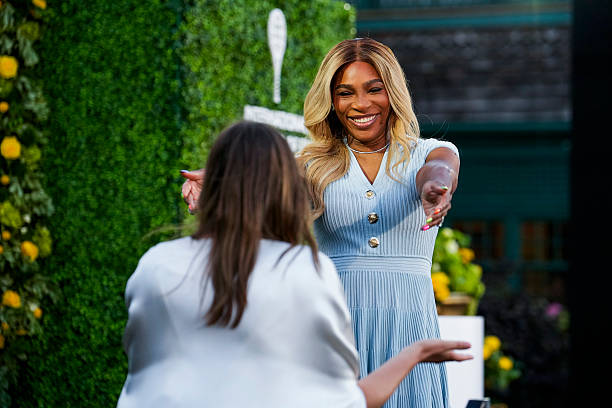 Serena Williams embraces Maria Sharapova.jpg