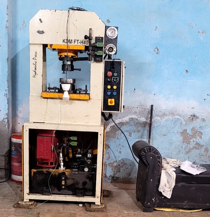 नकली सिक्के बनाने वाली मशीन.