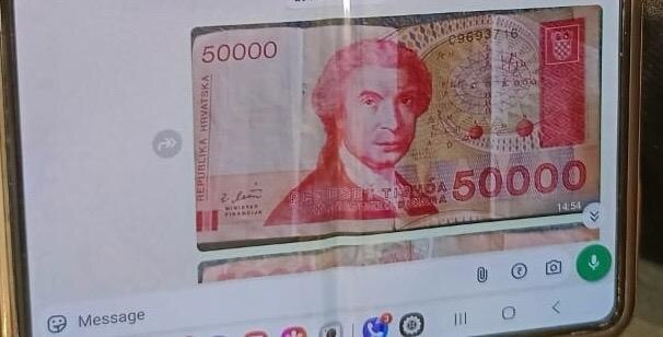 शहजाद शेख के मोबाइल फोन से क्रोएशिया की करेंसी की फोटो मिली