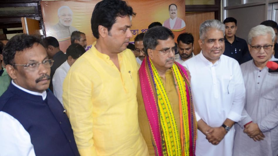 Newly appointed Tripura Chief Minister Manik Saha with former chief minister Biplab Kumar Deb and Union Minister Bhupender Yadav Newly appointed Tripura Chief Minister Manik Saha with former chief minister Biplab Kumar Deb and Union Minister Bhupender Yadav