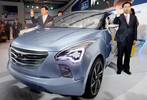 B-town stars sizzle at Auto Expo 2012