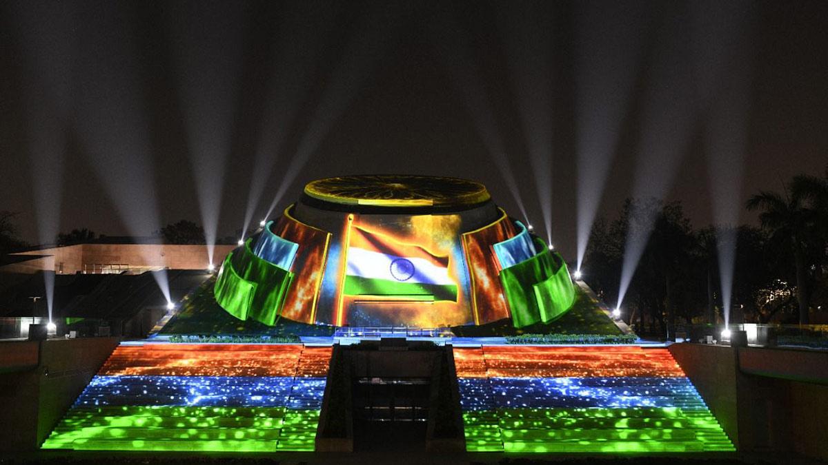 The building is made on a land area of about 10,491 sq mt. The logo of the building represents the hands of the people of India holding the Chakra symbolising the nation and democracy.