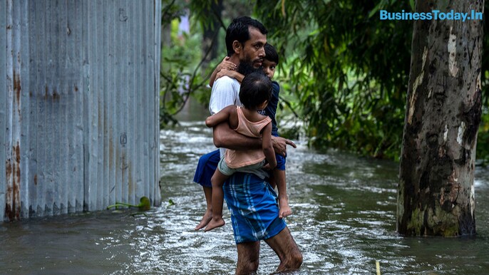 Nearly a quarter-million people are now living in emergency relief camps in Assam, and many others have constructed their own temporary shelters and cobbled together basic rafts to escape areas cut off by the floods. Nearly a quarter-million people are now living in emergency relief camps in Assam, and many others have constructed their own temporary shelters and cobbled together basic rafts to escape areas cut off by the floods.