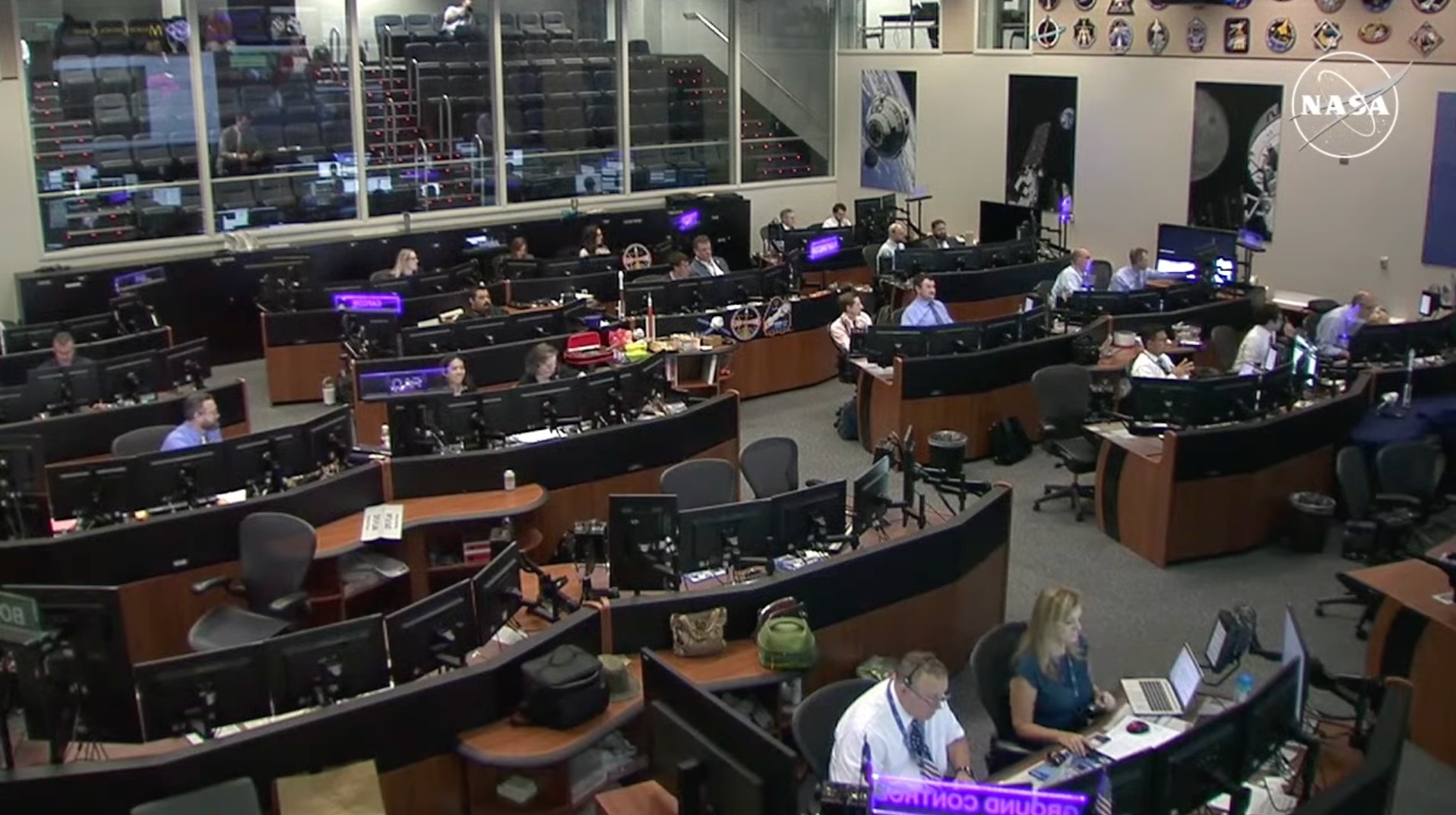 NASA scientists in Houston managing the spacecraft autonomously from their control center.