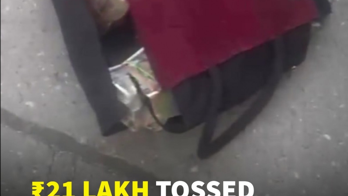 #WATCH : ED Raid Shock: ₹21 Lakh Cash Allegedly Thrown From 9th Floor During Search