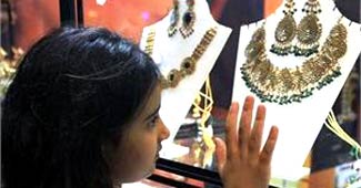 Gold to touch record high, silver jumps highest since Mar 2008