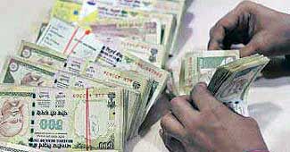 Rupee gains 9 paise against dollar in early trade