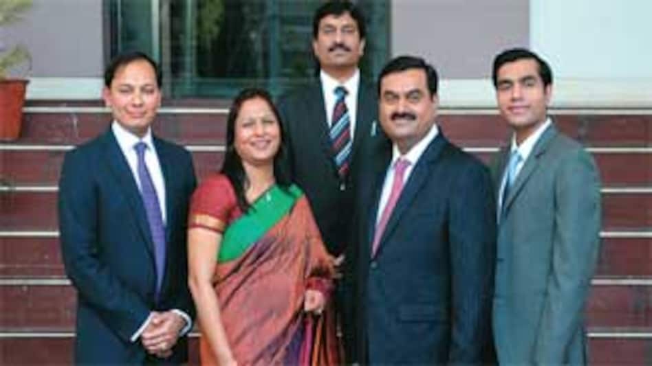The Adanis: (From left) Pranav, Priti, Rajesh, Gautam and Karan The Adanis: (From left) Pranav, Priti, Rajesh, Gautam and Karan