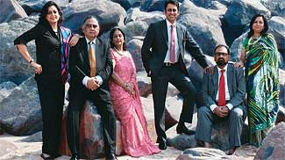 The Saxenas: (from left) Daughter Shalini Kumar; founder Jagdish; wife Sneh, son Anuj; Alok and wife Niti at Versova beach in Mumbai The Saxenas: (from left) Daughter Shalini Kumar; founder Jagdish; wife Sneh, son Anuj; Alok and wife Niti at Versova beach in Mumbai