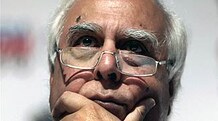 Panel slams Tata arm on VSNL land issue Telecom minister Kapil Sibal had initiated the probe into the demerger