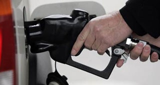 Oil companies hike petrol price by Rs 5 per litre Oil companies hike petrol price by Rs 5 per litre