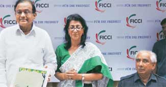 Home minister P. Chidambaram, Ficci vice president and HSBC country head Naina Lal Kidwai and BJP leader Jaswant Singh in New Delhi on July 27, 2011.