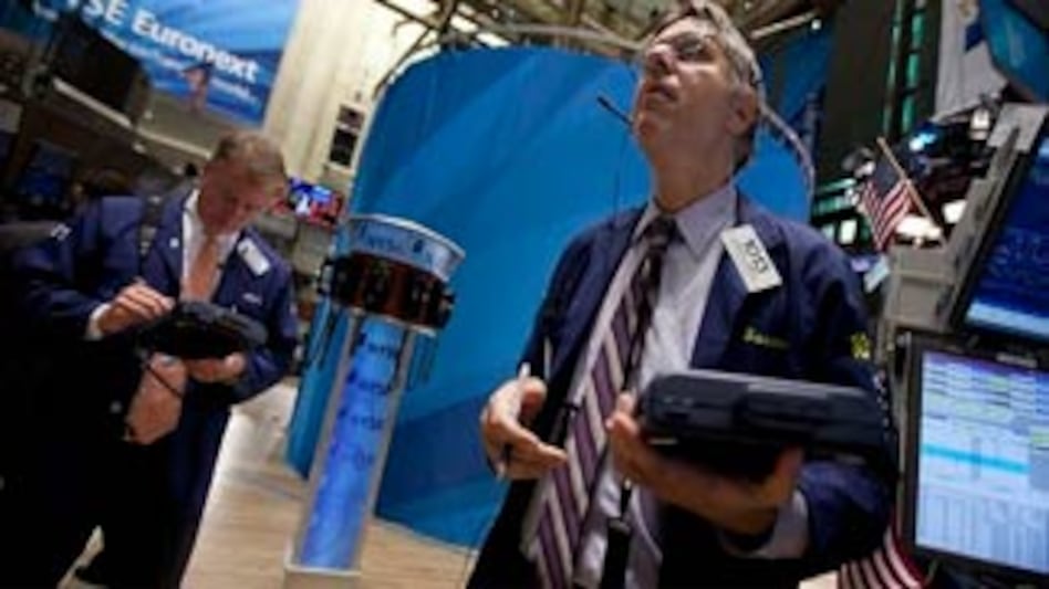 Traders at the New York Stock Exchange. The Dow plunged nearly 513 points on Thursday, August 4, 2011, its biggest point decline since Oct 22, 2008. <em>Photo: AP</em> Traders at the New York Stock Exchange. The Dow plunged nearly 513 points on Thursday, August 4, 2011, its biggest point decline since Oct 22, 2008. <em>Photo: AP</em>